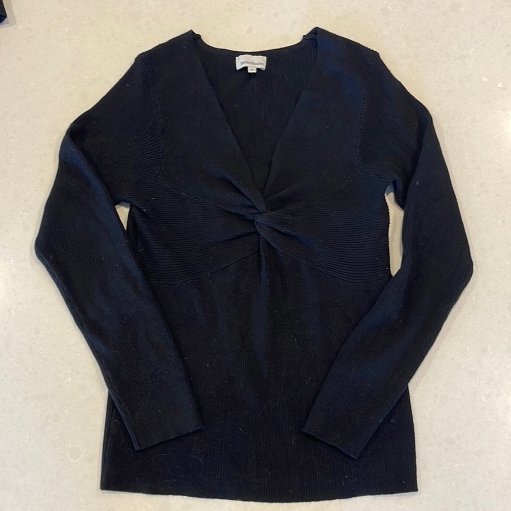 Black sweater with twist detail